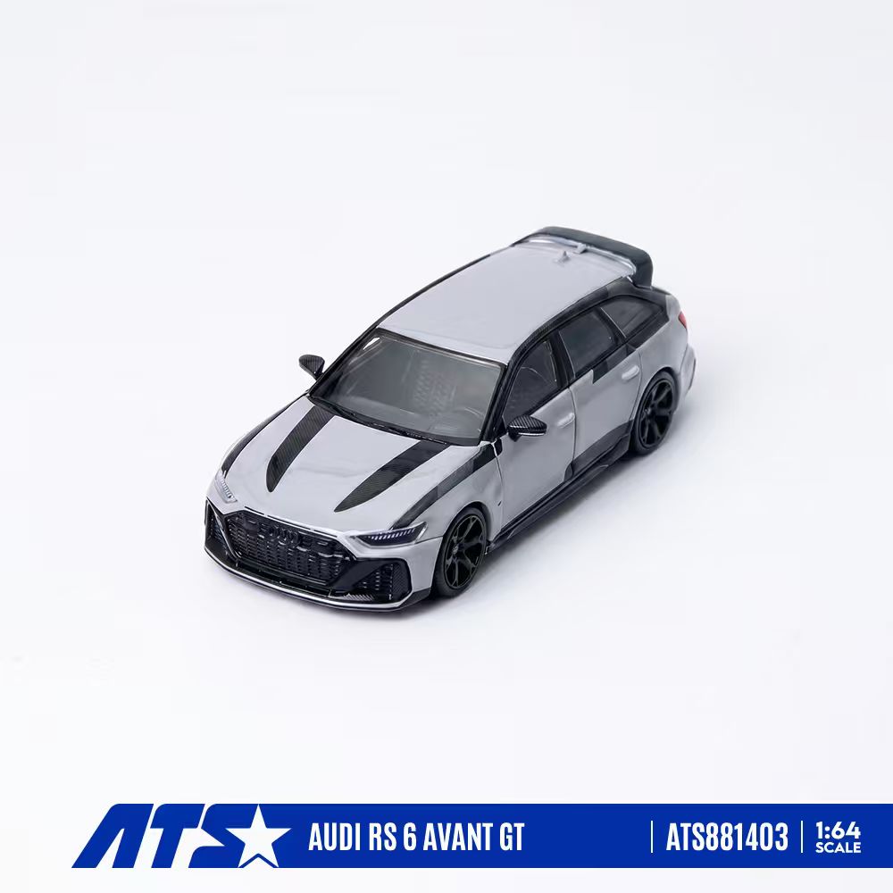 A scale model of an Audi RS 6 Avant GT in metallic silver with black racing stripes, shown from a three-quarters front angle on a white background with an ATS brand banner at the bottom.
