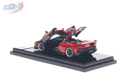 1:64 scale Ferrari F80 diecast model in Rosso Corsa red displayed on a premium presentation base with the butterfly doors and rear engine cover opened, showcasing the detailed cockpit and engine compartment. Features carbon fiber accents, realistic wheels, aerodynamic bodywork, and functional opening parts, making it a premium collectible for Ferrari enthusiasts and diecast model collectors