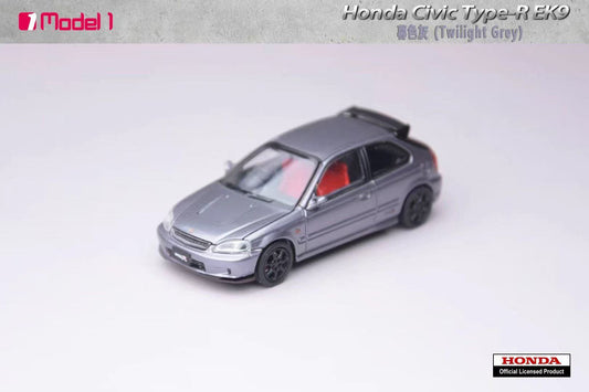 A scale model of a Honda Civic Type-R EX9 in Twilight Grey, shown from a three-quarters front angle on a white studio background with brand logos.