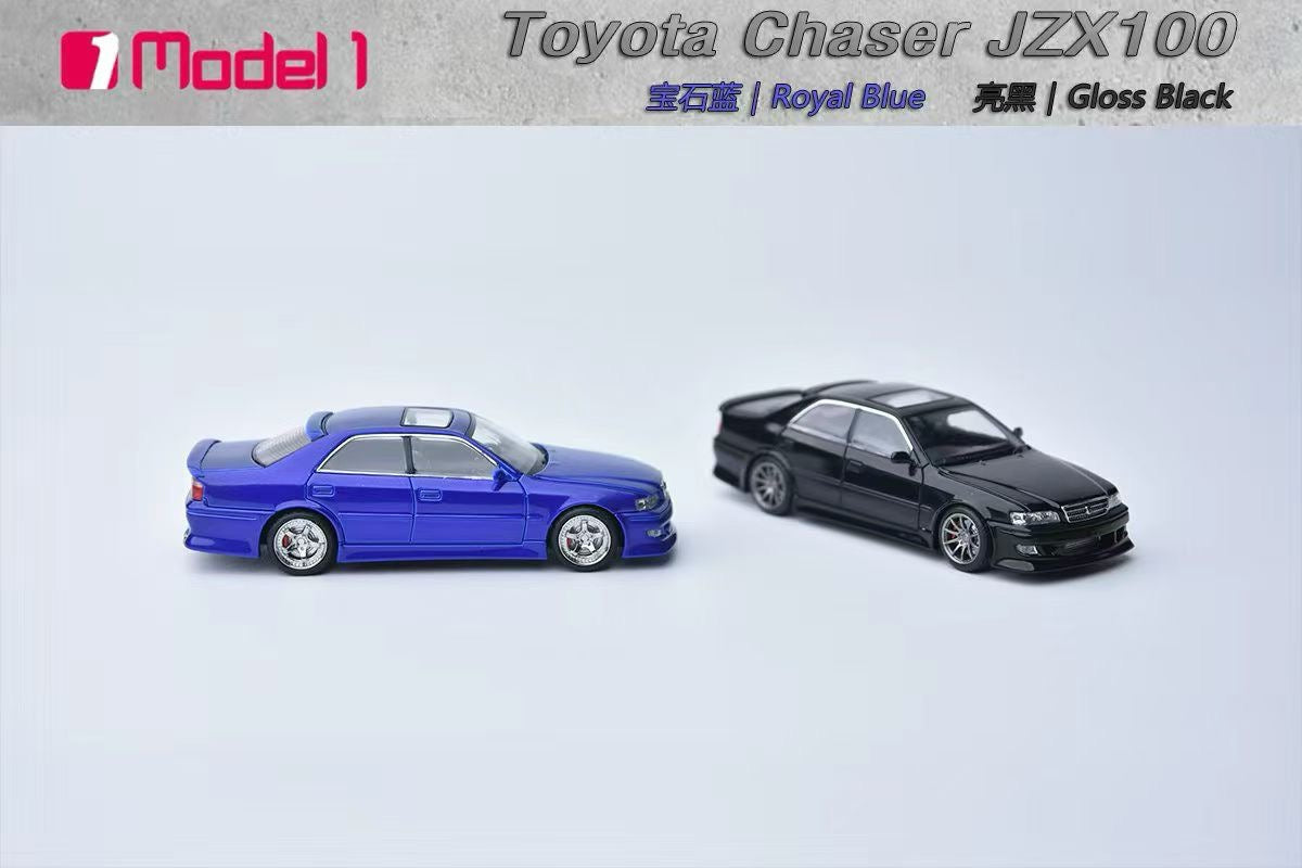Two model cars, one blue and one black, on a light gray background with 'Toyota Chaser JZX100' text above.