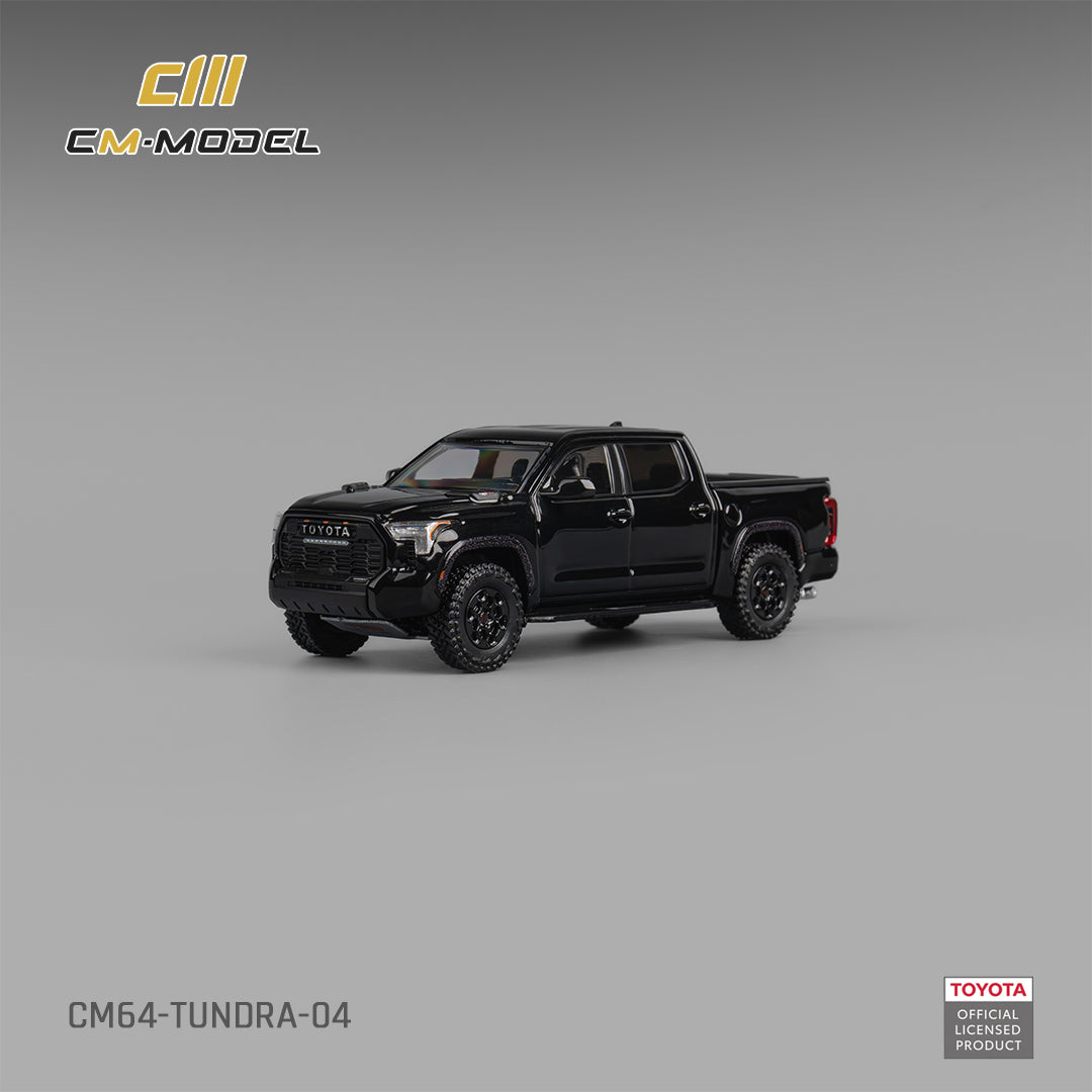 Black Toyota Tundra model truck on a gray background with CM Model branding.