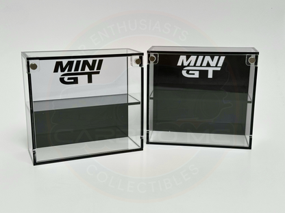 Two Mini GT display cases, transparent cover with a black/white background, both with the Mini GT logo on the top.