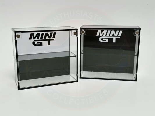 Two Mini GT display cases, transparent cover with a black/white background, both with the Mini GT logo on the top.