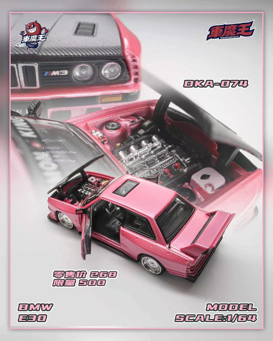 Pink model car with open doors and engine compartment on a light gray background