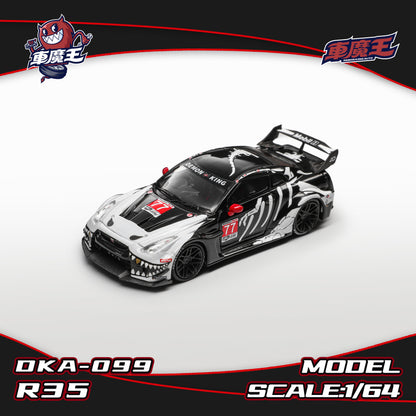 Model car of a Nissan R35 in 1:64 scale, featuring a black and white design with red accents, bold graphics, and a large rear spoiler.