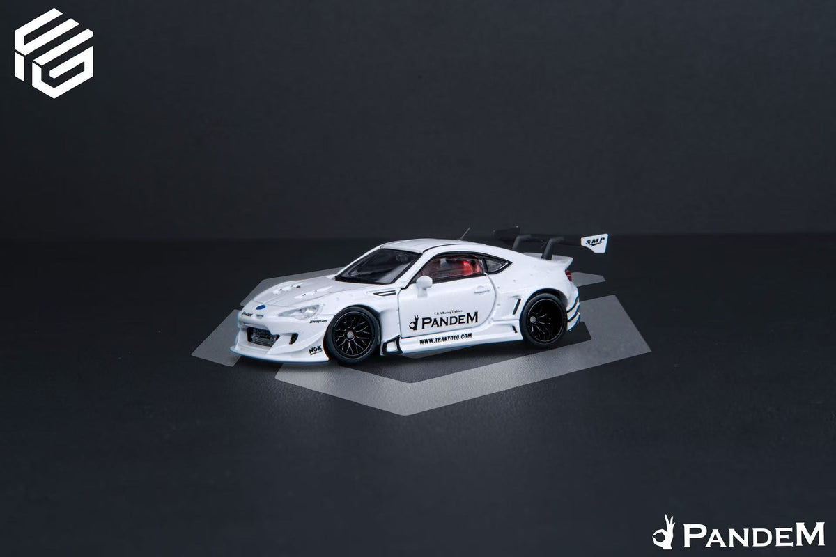 White sports car with 'Pandem' branding on a dark background