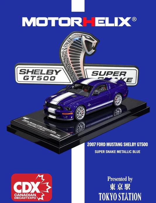 MotorHelix 1:64 2007 Ford Mustang Shelby GT500 Super Snake Metallic Blue diecast model with white racing stripes, CDX Canadian Diecast Expo exclusive presented by Tokyo Station.