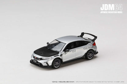 Silver and black diecast model car on a white background, featuring a sporty design with a rear spoiler from the JDM64 Japanese Diecast Model series.