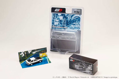 Model car kit packaging with a card and box on a white background