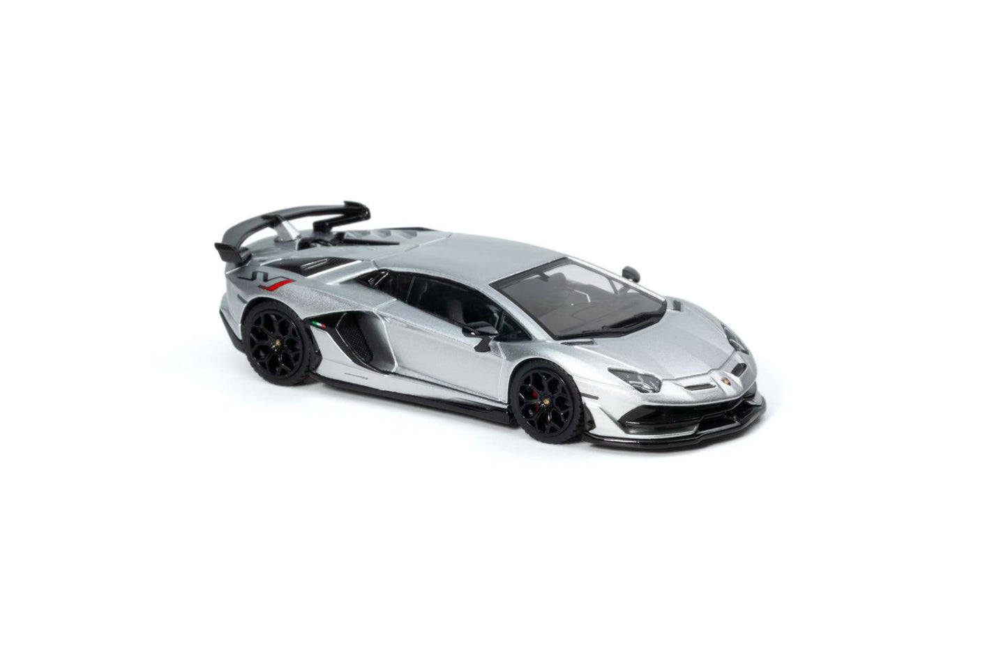 Model of a silver lamborghini svj on a white background