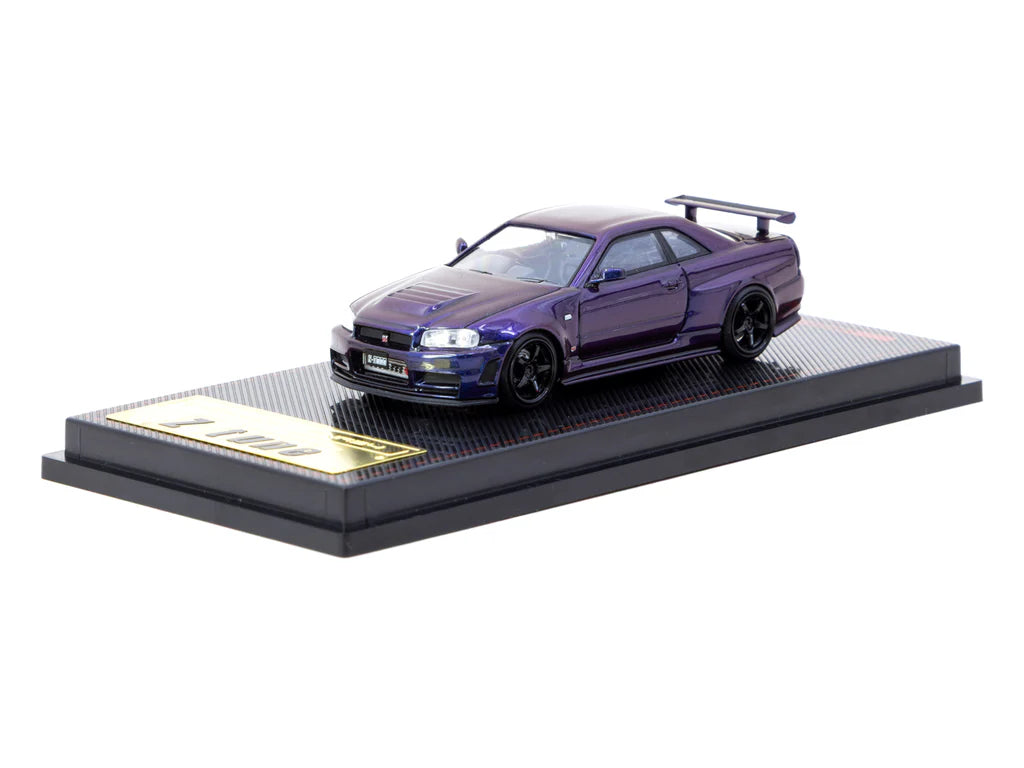Model car on a display stand with a white background