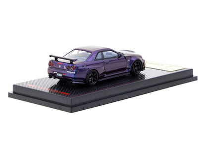 Model car on a display stand with a white background