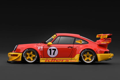 Red and yellow race car with number 17 on a dark background