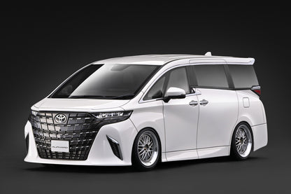 A white customized Toyota Alphard minivan with a black front grille and multi-spoke alloy wheels, photographed on a dark studio background.