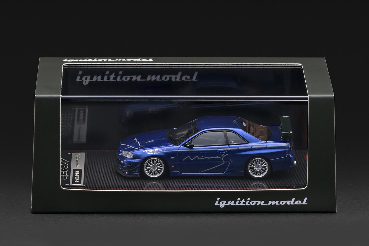 Ignition Model 1:64 Nissan Skyline GT-R Mine’s R34 Blue Metallic IG4094 diecast model displayed in its presentation case, side view.