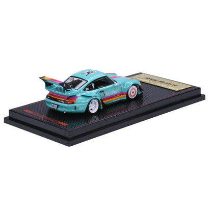 Ignition Model Porsche 911 993 RWB 1:64 resin model in turquoise Vaillant racing livery #9, Tokyo Station exclusive IG4142, rear three-quarter view with white wheels and large rear wing.