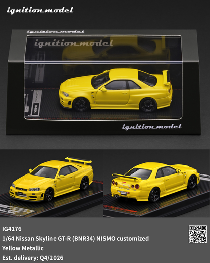 Yellow model car in a display case with 'ignition model' branding.