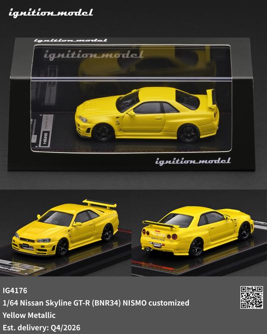 Yellow model car in a display case with 'ignition model' branding.