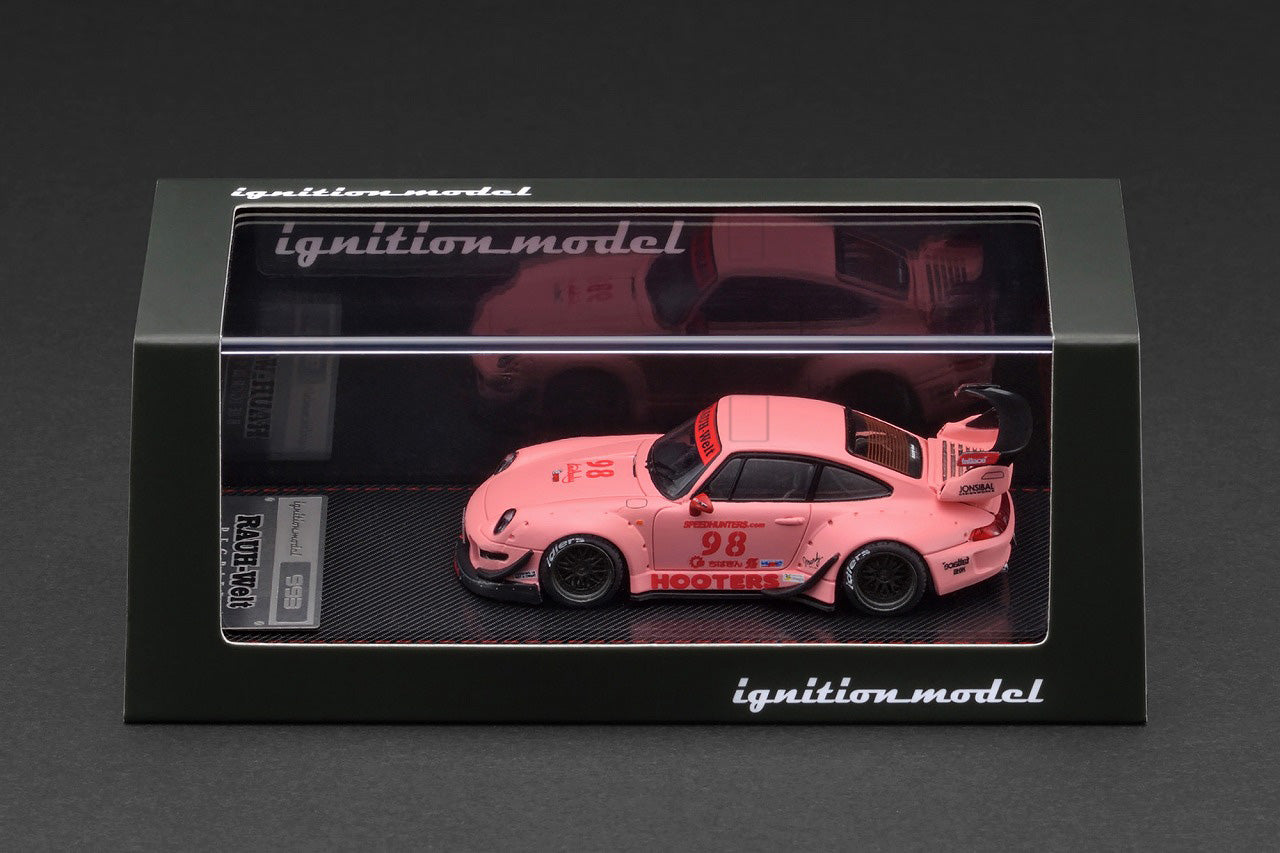 Pink RWB 993 model car in a clear display case with 'ignition model' branding.