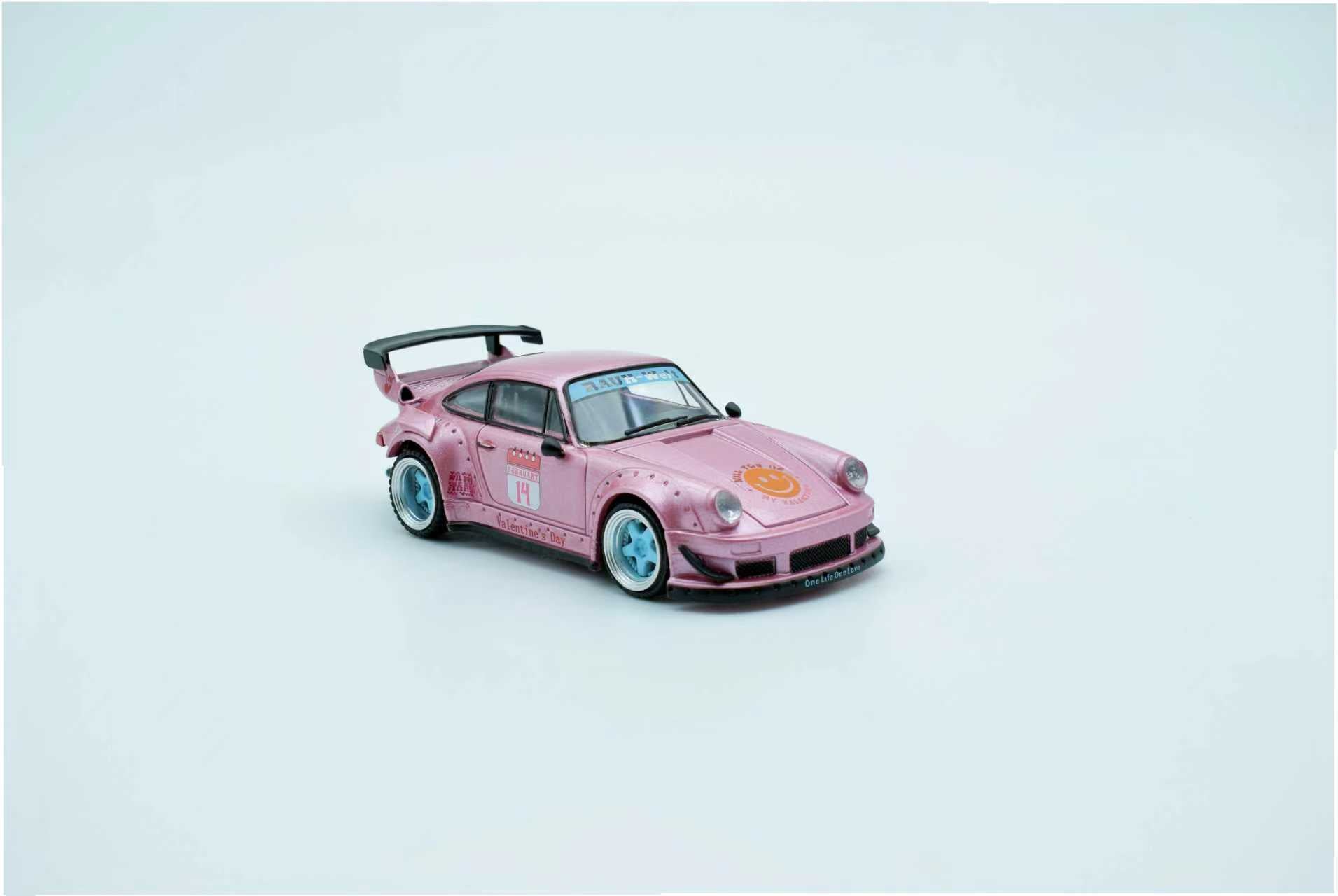 Pink toy car on a light blue background