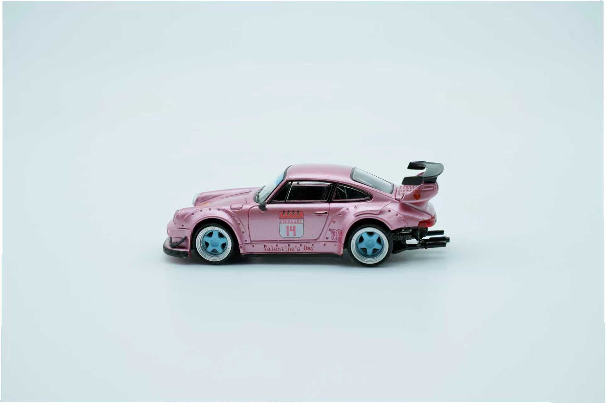 Pink toy car with black accents on a light gray background