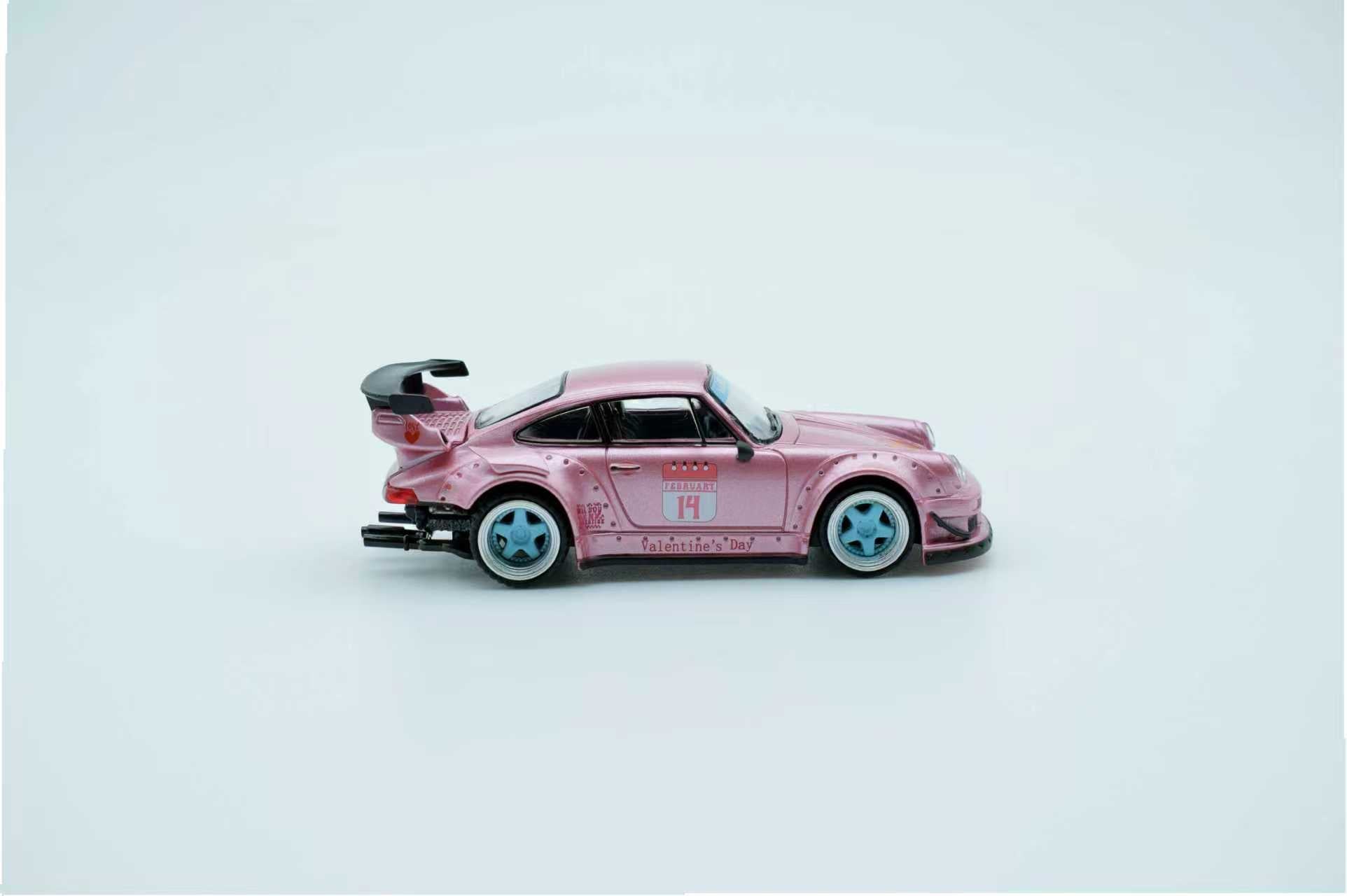Pink toy car on a light gray background