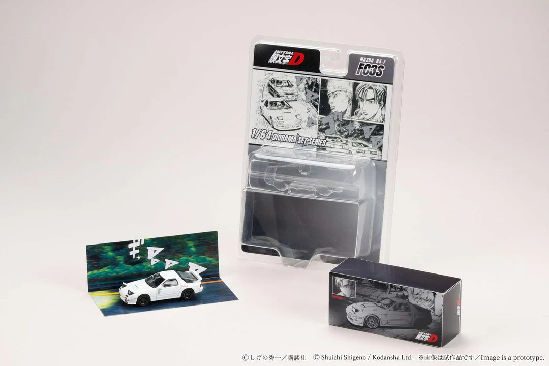 Model car kit with packaging and display stand on a white background