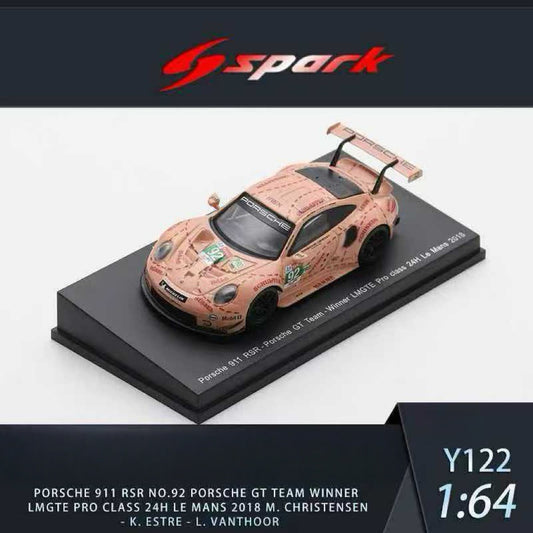 Model car on a display stand with Spark logo above