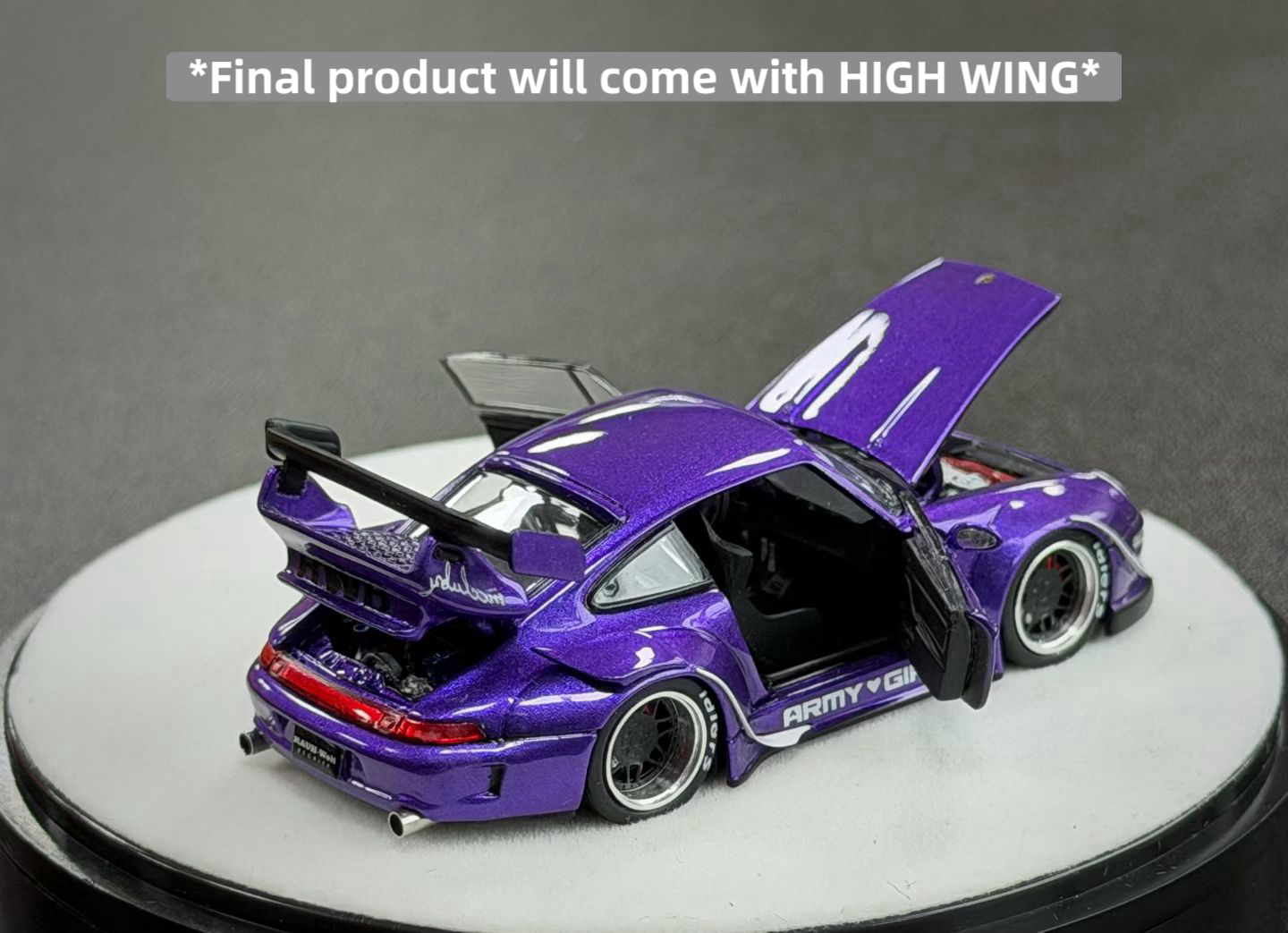 Purple model car with open doors on a gray background