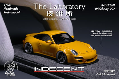 Yellow model car with branding and text on a dark background