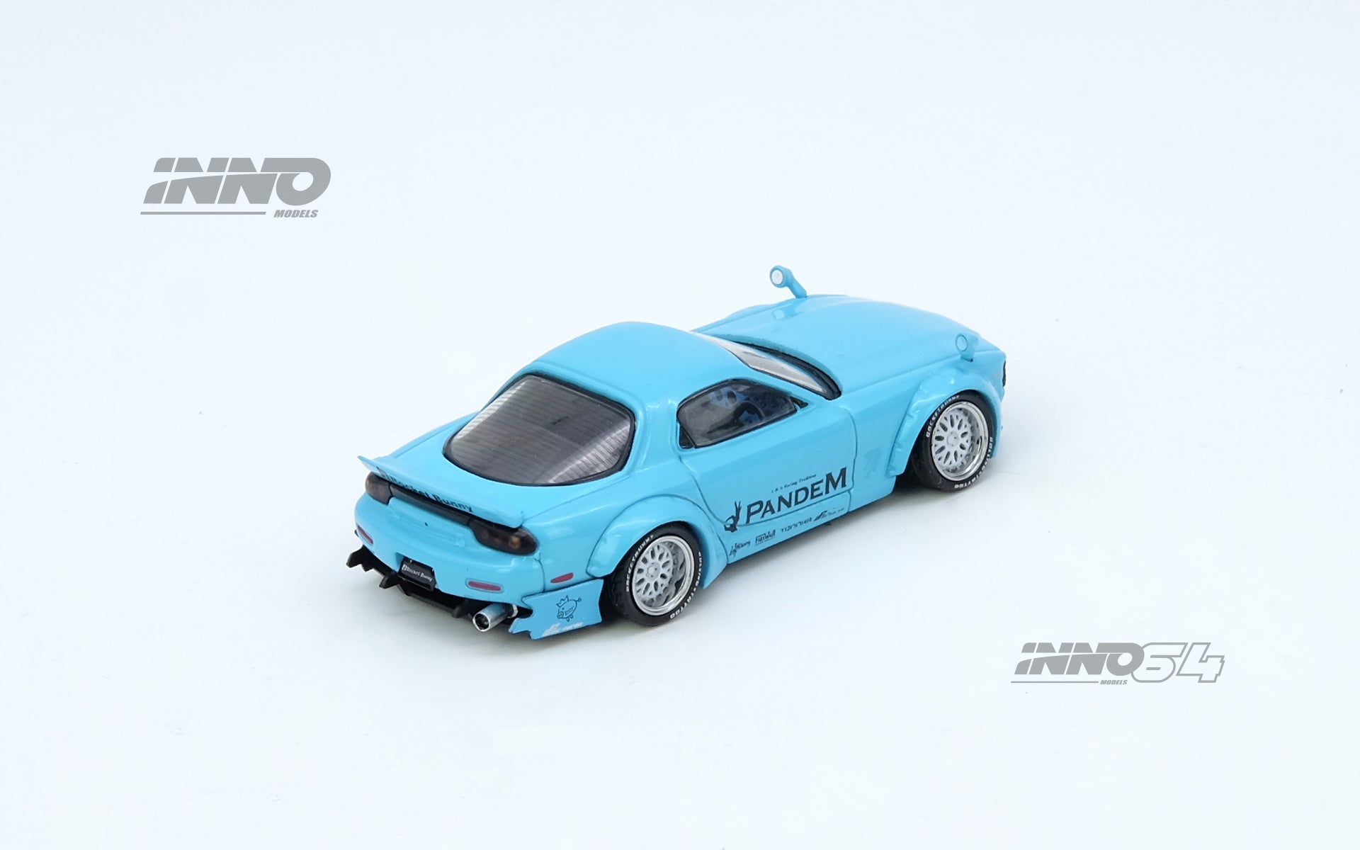 Blue model car with 'Pandem' branding on a white background