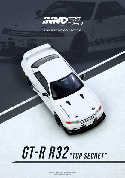 Model car of a GT-R R32 with 'Top Secret' text on a track, featuring INNO54 branding.