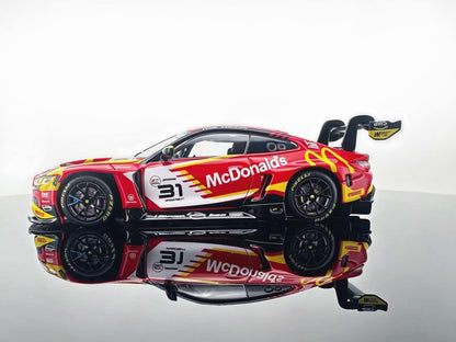 JICAR 1:64 M4 GT3 EVO #31 Red & Yellow Fast Food Racing Livery diecast model featuring red and yellow graphics, black racing wheels, detailed sponsor decals and large rear wing, side profile view.