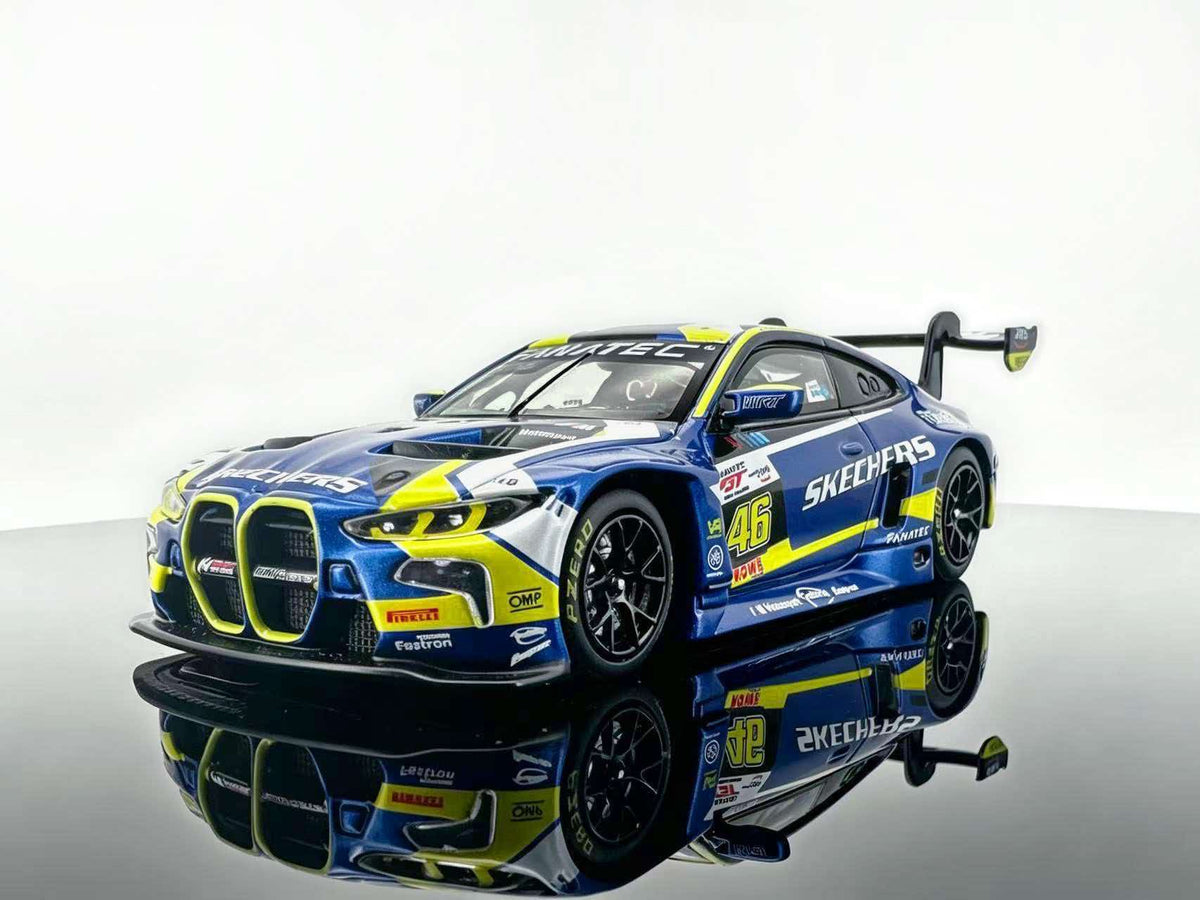 JICAR 1:64 M4 GT3 EVO #46 Blue & Yellow Racing Livery diecast model featuring Skechers racing graphics, Valentino Rossi-inspired design, black racing wheels, detailed front grille and large rear wing, front three-quarter view.
