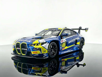 JICAR 1:64 M4 GT3 EVO #46 Blue & Yellow Racing Livery diecast model featuring Skechers racing graphics, Valentino Rossi-inspired design, black racing wheels, detailed front grille and large rear wing, front three-quarter view.
