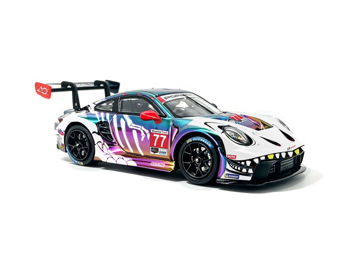 JICAR 1:64 Porsche 911 GT3 R #77 Iridescent Rainbow Chrome Tyrannosaurus Skeleton Livery Diecast Model Car Front Three Quarter View with Holographic Dinosaur Skeleton Graphics, Sharp Teeth Front Bumper, Black Racing Wheels and Large Rear Wing