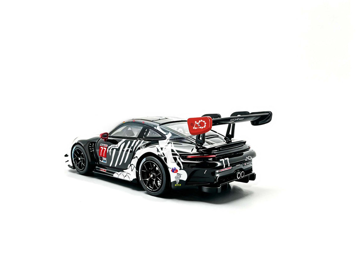 JICAR 1:64 Porsche 911 GT3 R #77 Tyrannosaurus Skeleton Livery White and Black Diecast Model Car Rear Three Quarter View Featuring Dinosaur Skeleton Graphics, Black Racing Wheels, Large Rear Wing, Dual Exhaust and Rear Diffuser.