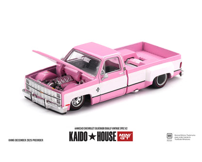 Pink and white model truck with open hood on a white background, featuring Kaido House and Min GT logos.