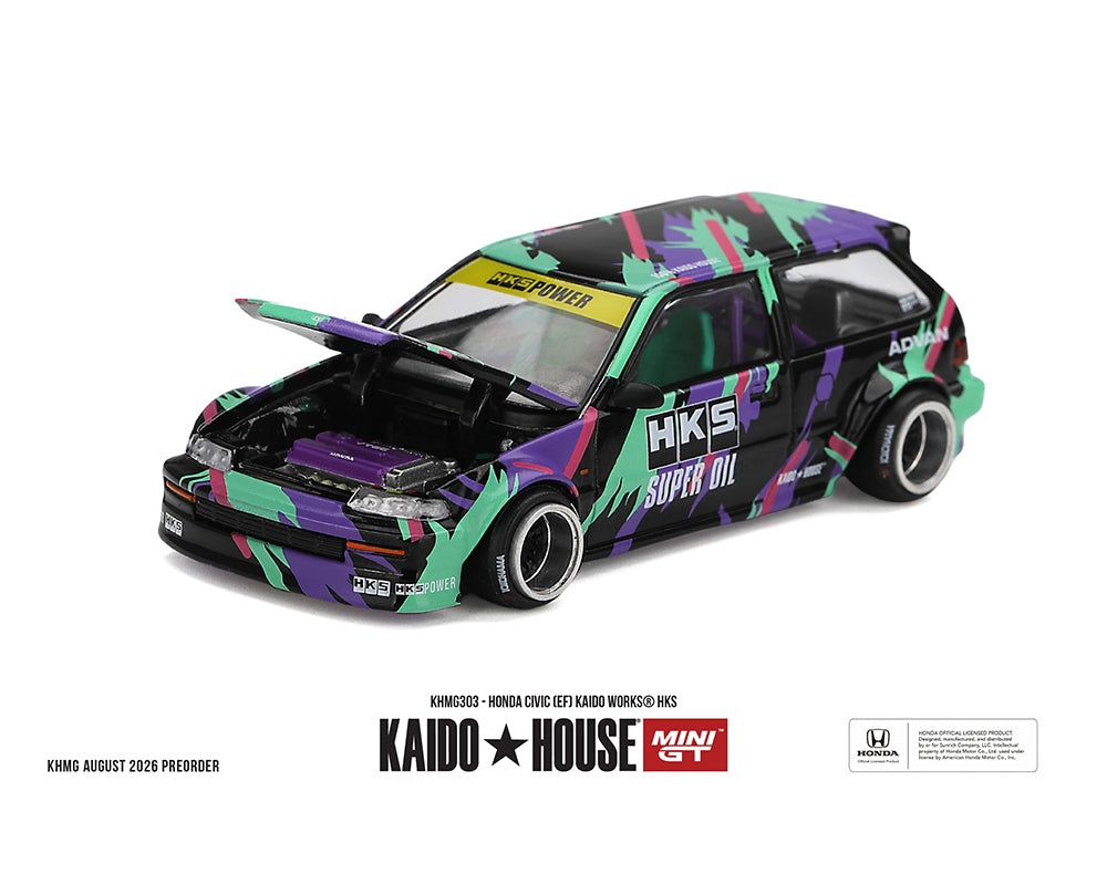 A diecast model car of a Honda Civic with a vibrant multicolor camouflage pattern in purple, green, and black. The car features an open hood showing a detailed engine bay, and various racing decals including 'HKS Super Oil' and 'Kaido House Mini GT'.