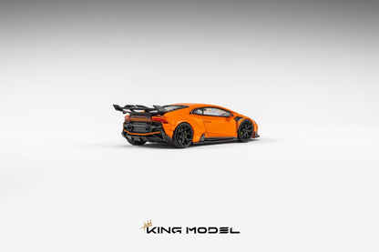 An orange and black scale model of a Lamborghini Huracan sports car, shown from a rear three-quarter angle on a light gray gradient background with the 'KING MODEL' logo at the bottom.