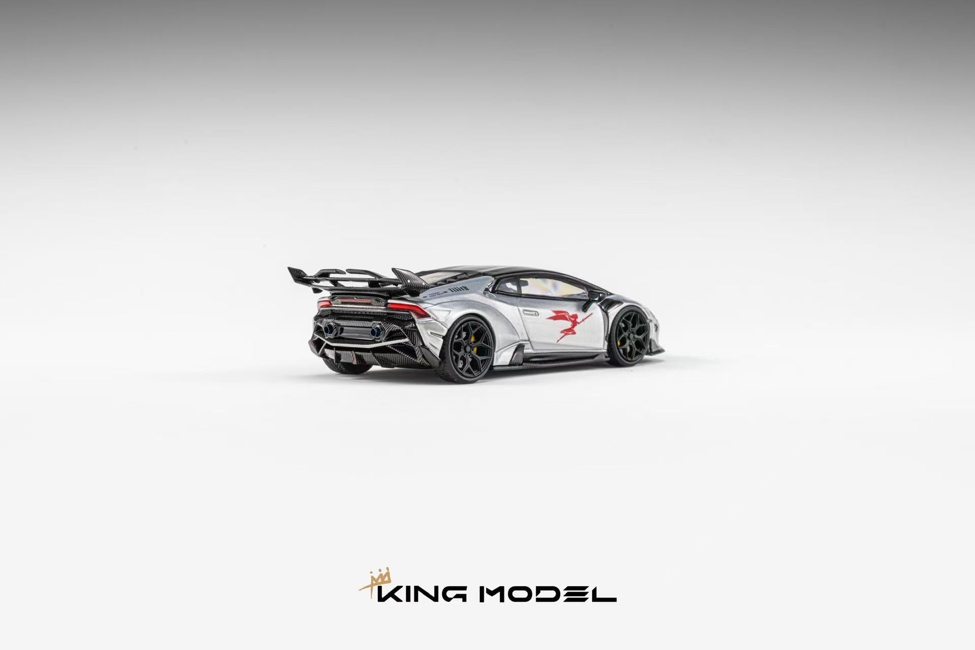 A scale model of a silver and black Lamborghini Huracan with red racing decals, shown from a rear three-quarter angle on a light gray gradient background with the brand name 'KING MODEL' at the bottom.