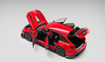 Red sports car with open doors on a gray background