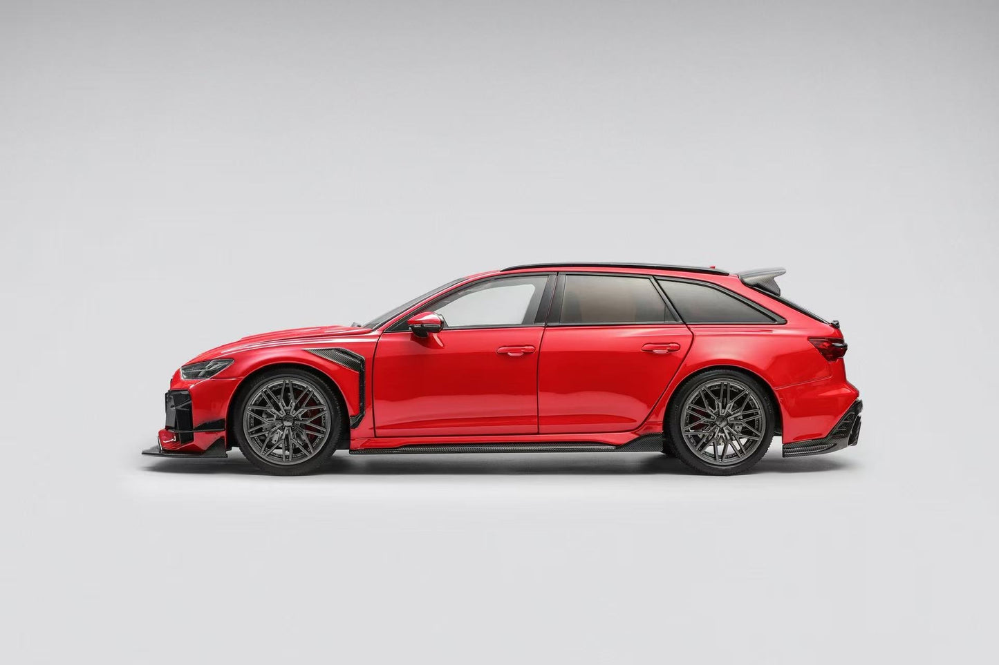 Red sports car on a gray background