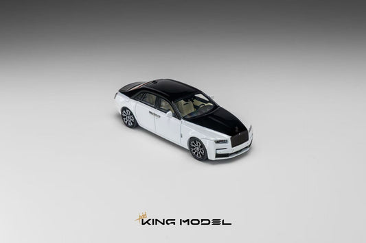 A miniature model of a Rolls-Royce Ghost sedan in a two-tone white and black livery, shown from a three-quarters perspective on a neutral gray gradient background with the 'KING MODEL' logo at the bottom.