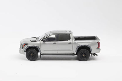 Model of a white pickup truck on a white background