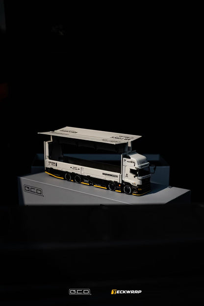 Hino Profia 700 DarwinPro &TECKWRAP Combat Grey Model truck on a dark background with 'Teckwrap' and 'GCD' branding.