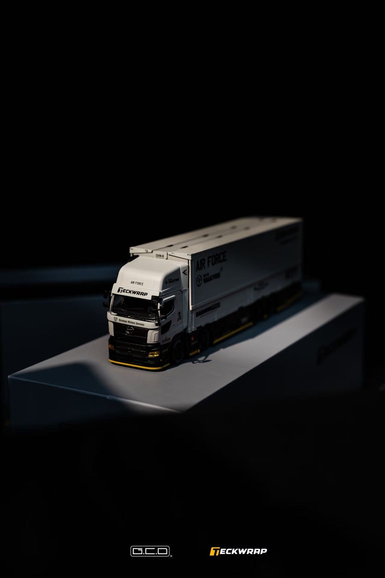 Hino Profia 700 DarwinPro &TECKWRAP Combat Grey Model truck on a dark background