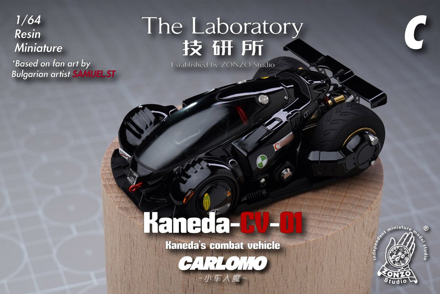 A 1/64 scale resin miniature of the Kaneda CV-01 combat vehicle by Carlomo, displayed on a wooden block. The model is primarily glossy black with small gold, red, and green accents.