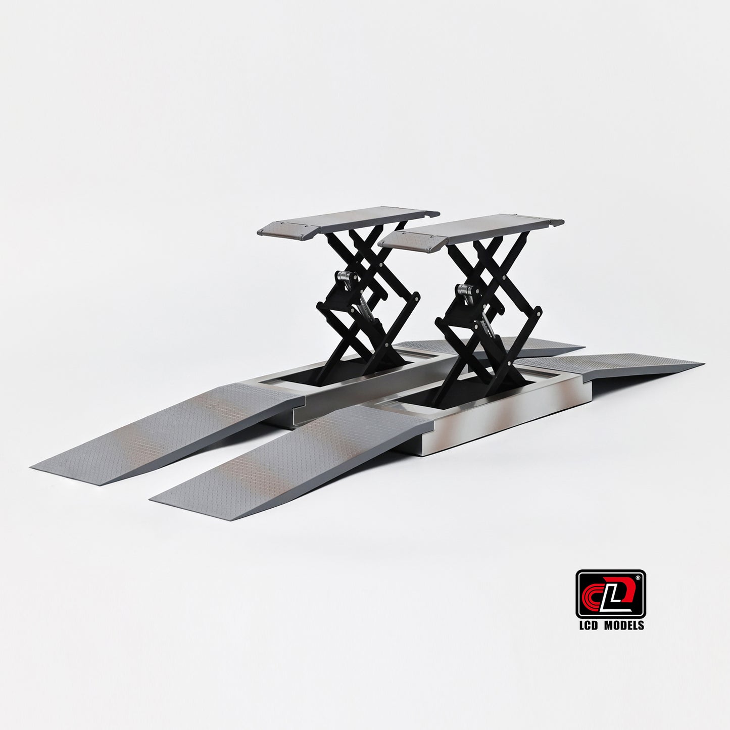 Set of car ramps on a white background with a visible brand logo.