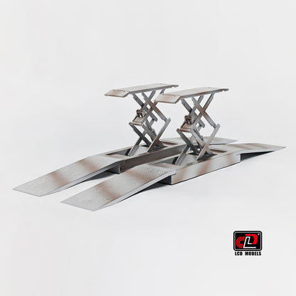 Metallic car lift on a white background with a visible brand logo.